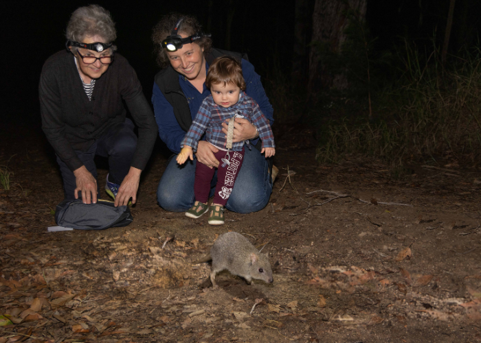 Felicity L’Hotellier, AWC Senior Wildlife Ecologist (middle), pictured releasing a Northern Bettong with mum Lavina and daughter Billie.