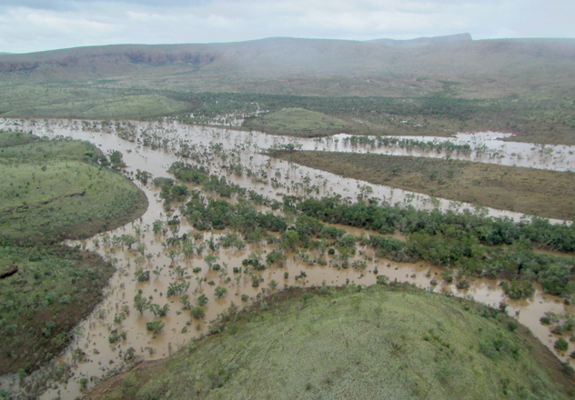 View from the rescue chopper of the Adcock River surging well beyond its banks.